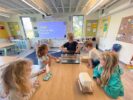 five young students study stem in a classroom at VDS